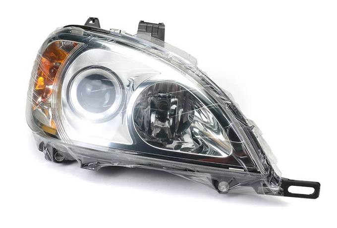 Mercedes Headlight Assembly - Passenger Side (Halogen) 163820506164 - Hella 223151061